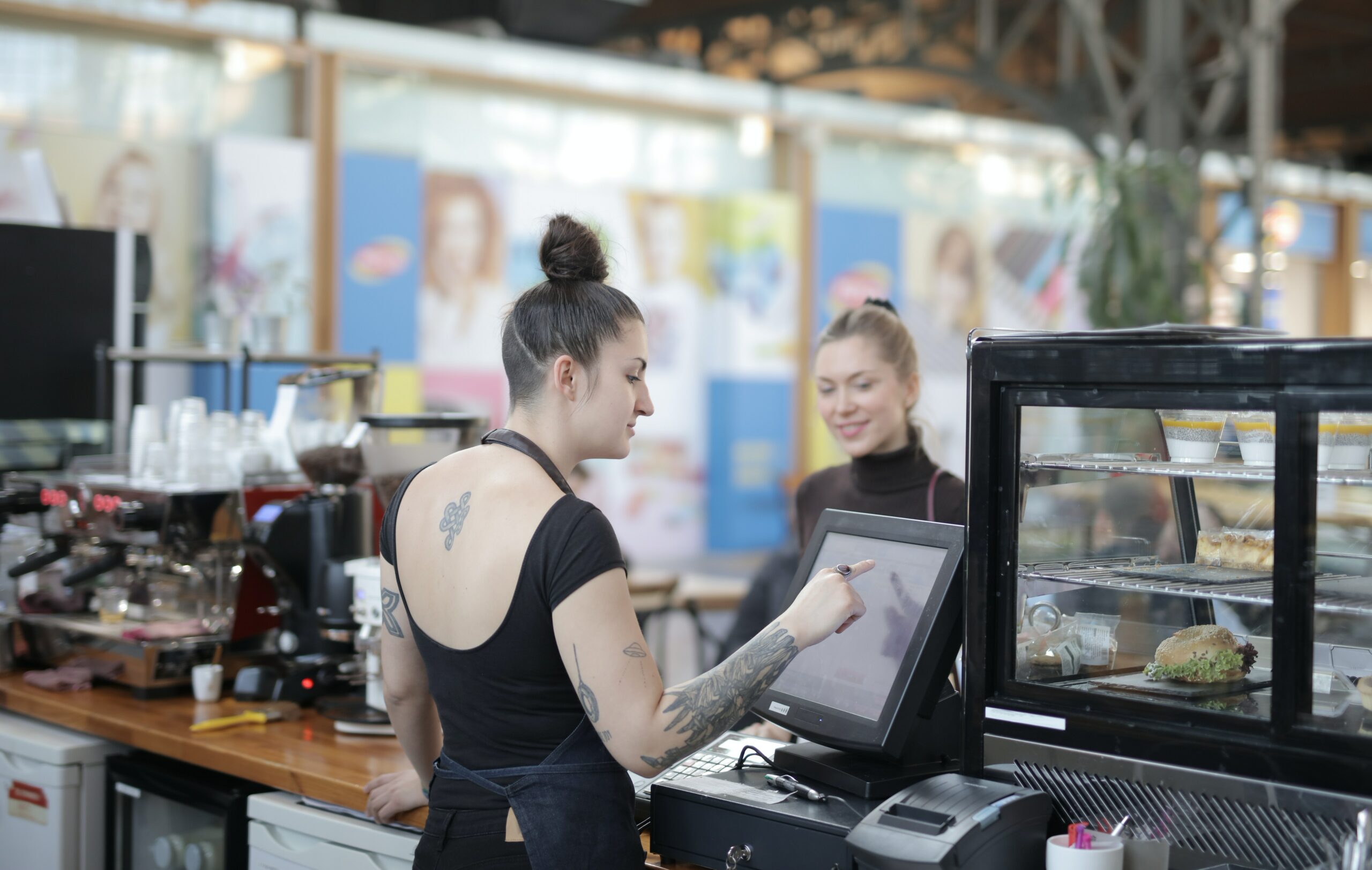 Woman at cafe doing business